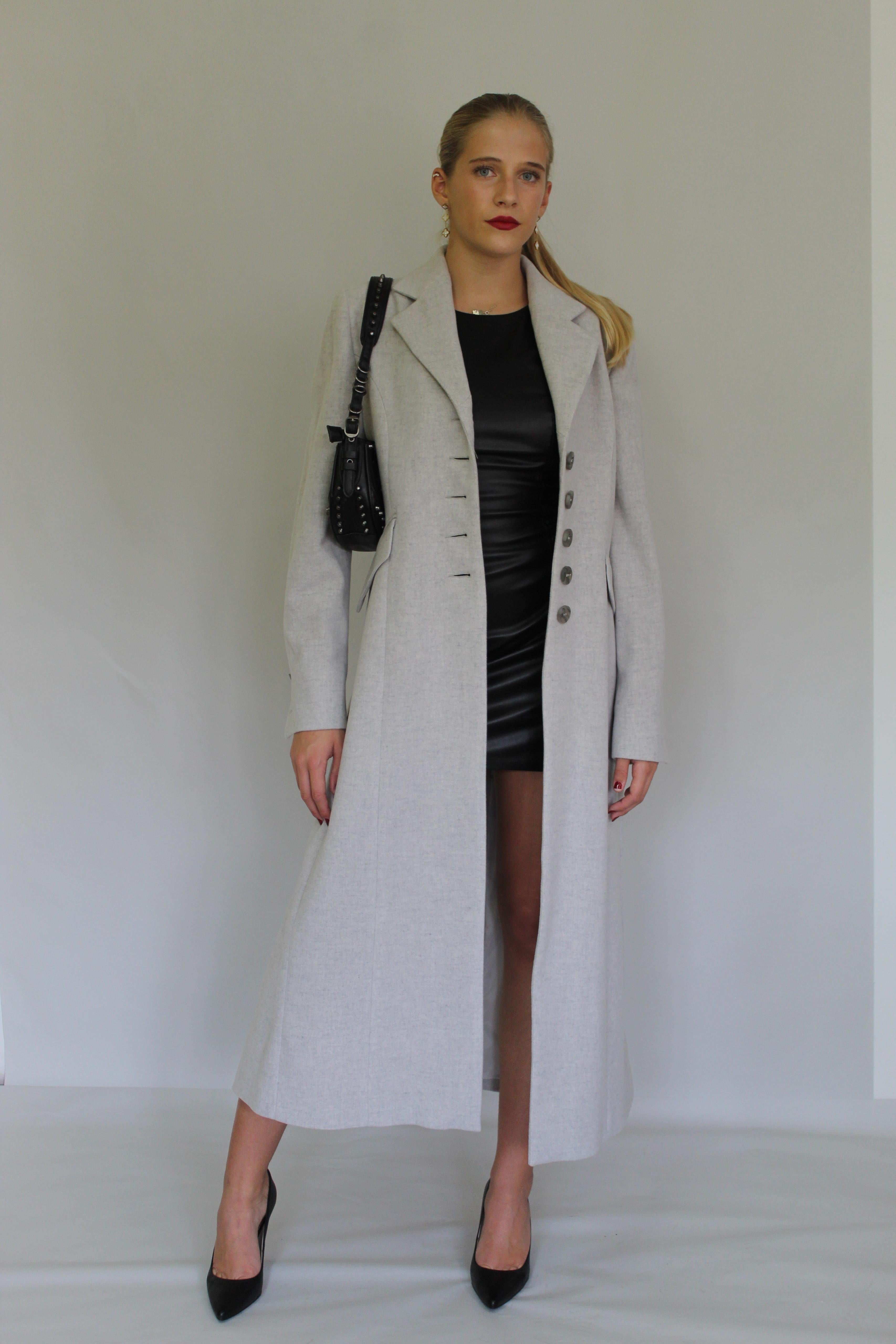 Long Row Buttoning Coat With Sleeve Detail