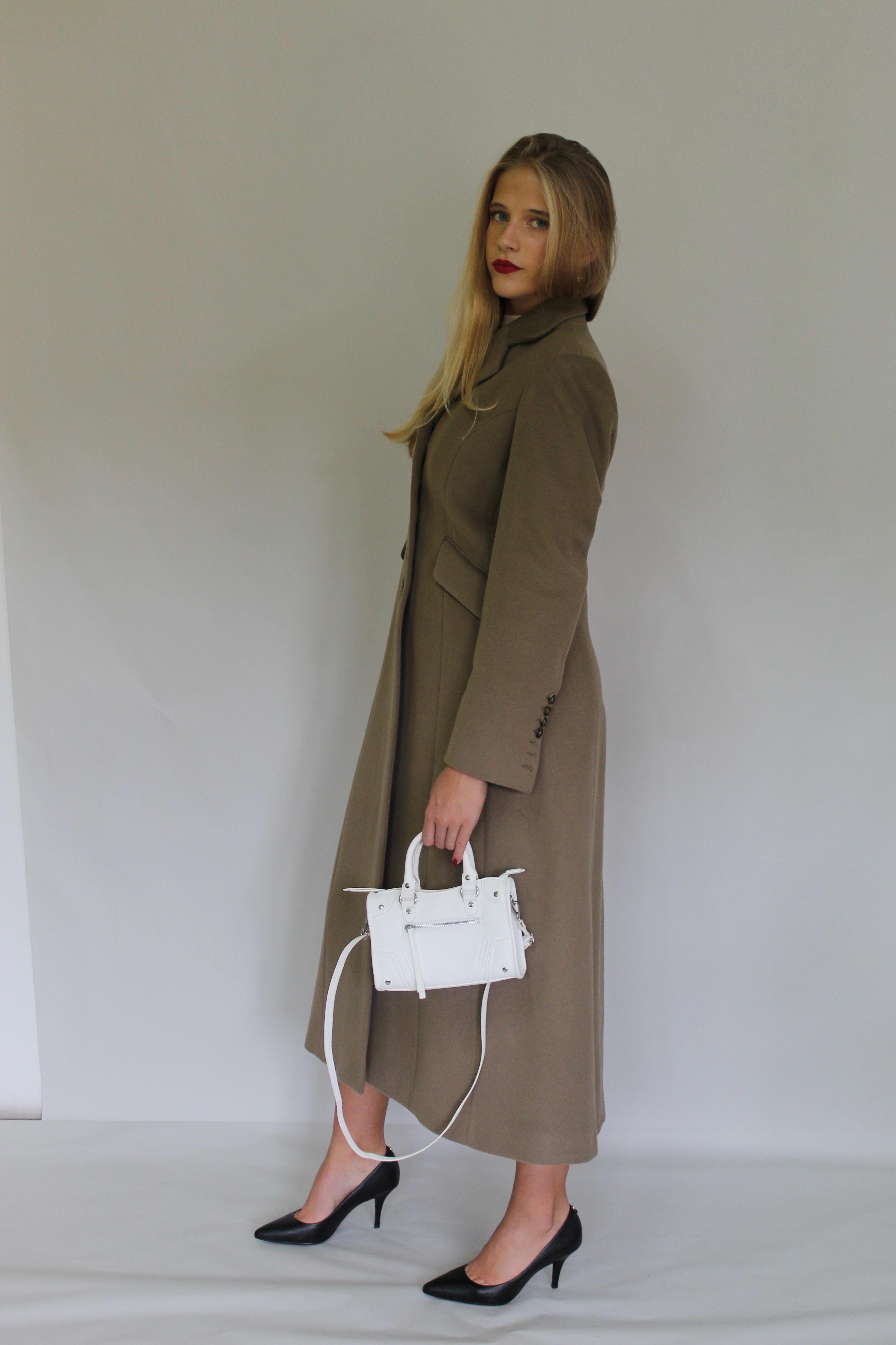 Long Row Buttoning Coat With Sleeve Detail
