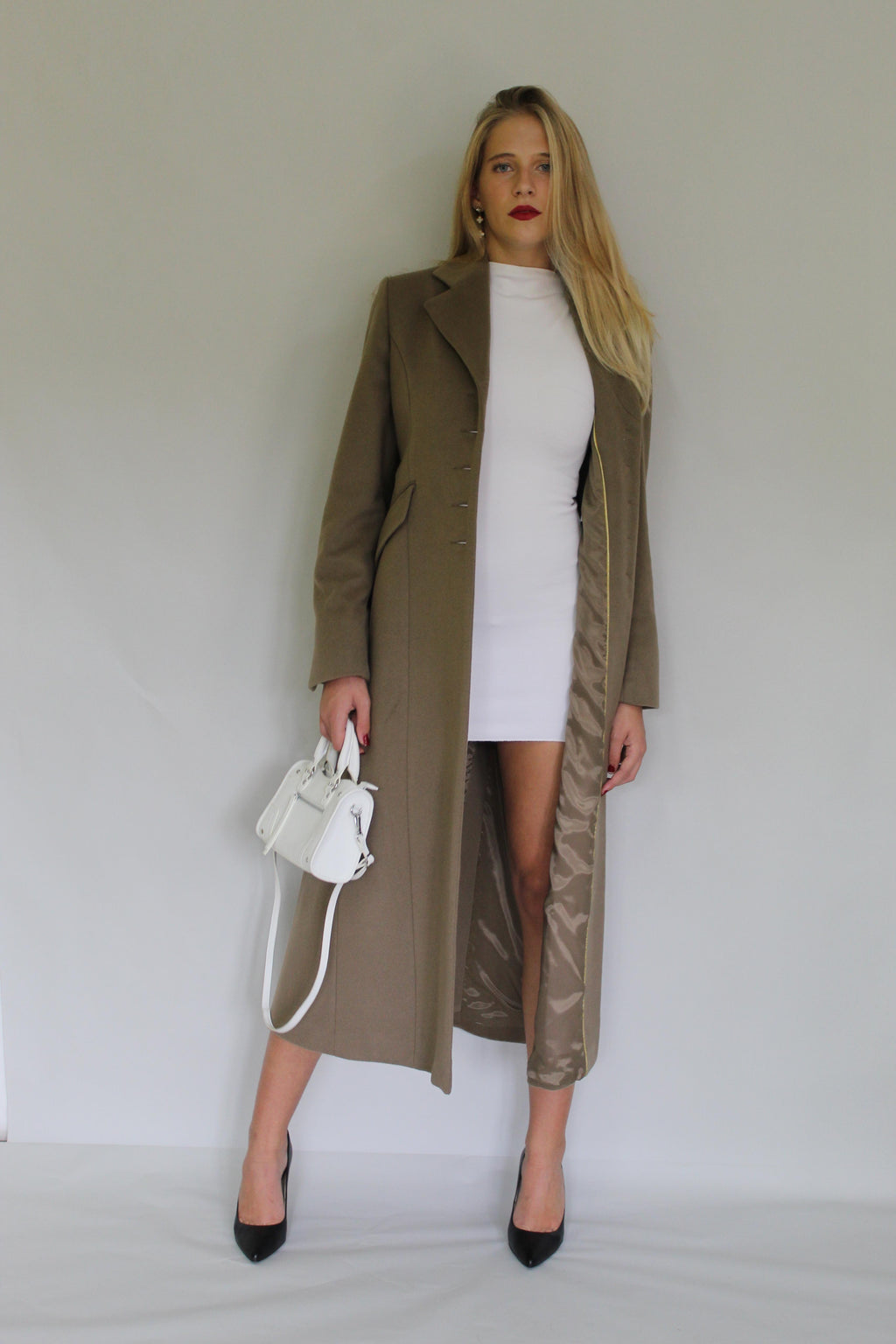 Long Row Buttoning Coat With Sleeve Detail