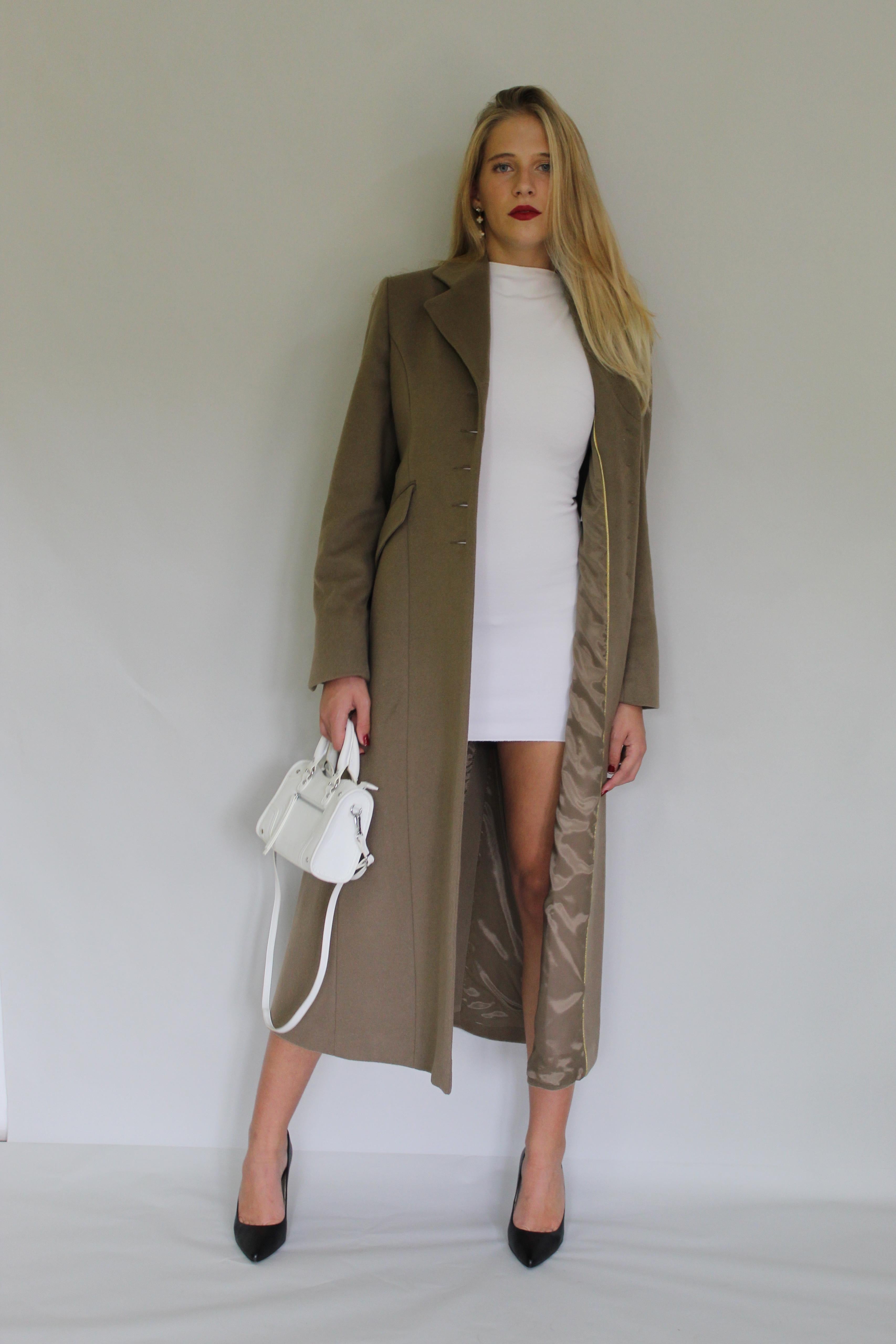 Long Row Buttoning Coat With Sleeve Detail