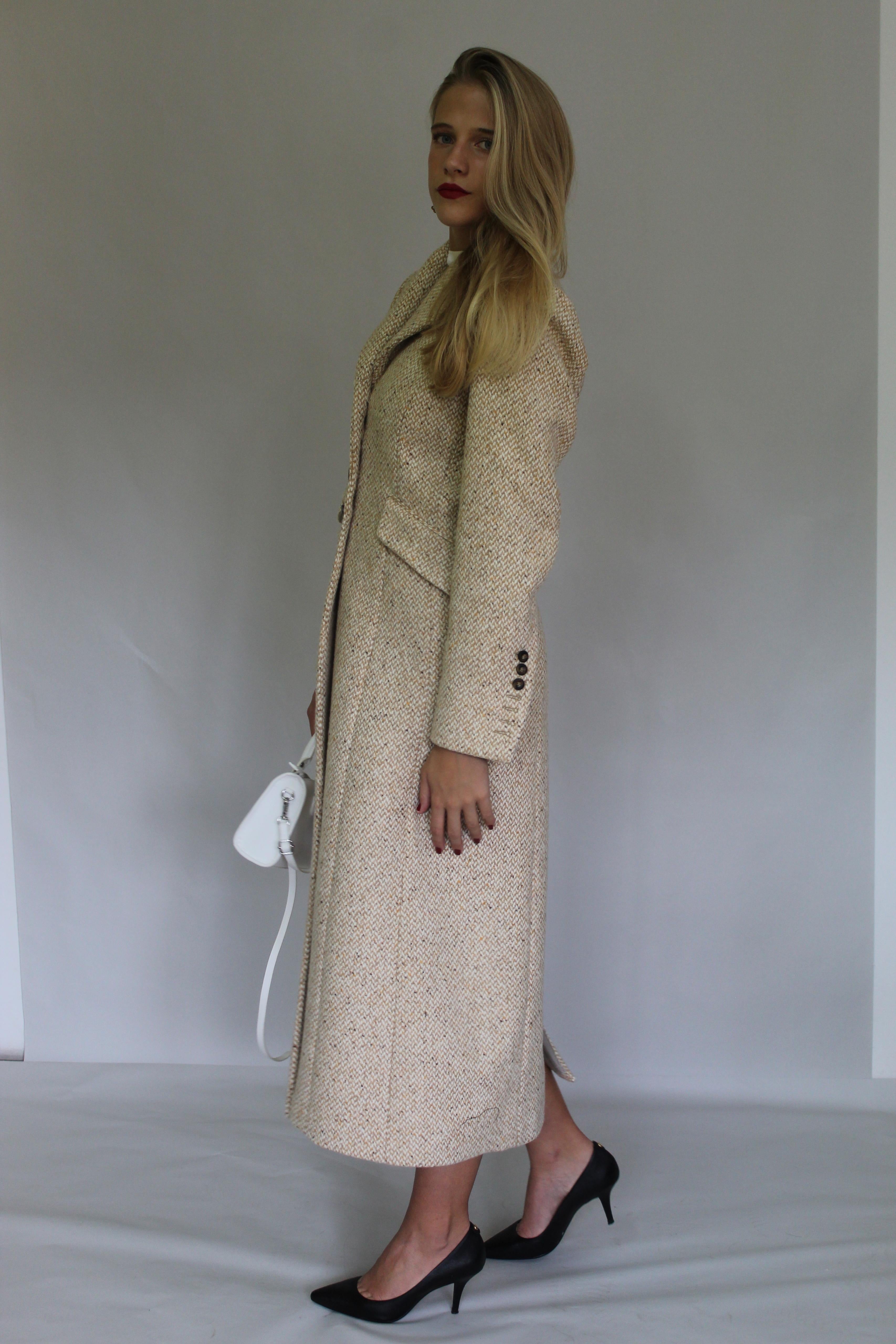 Long Row Buttoning Coat With Sleeve Detail
