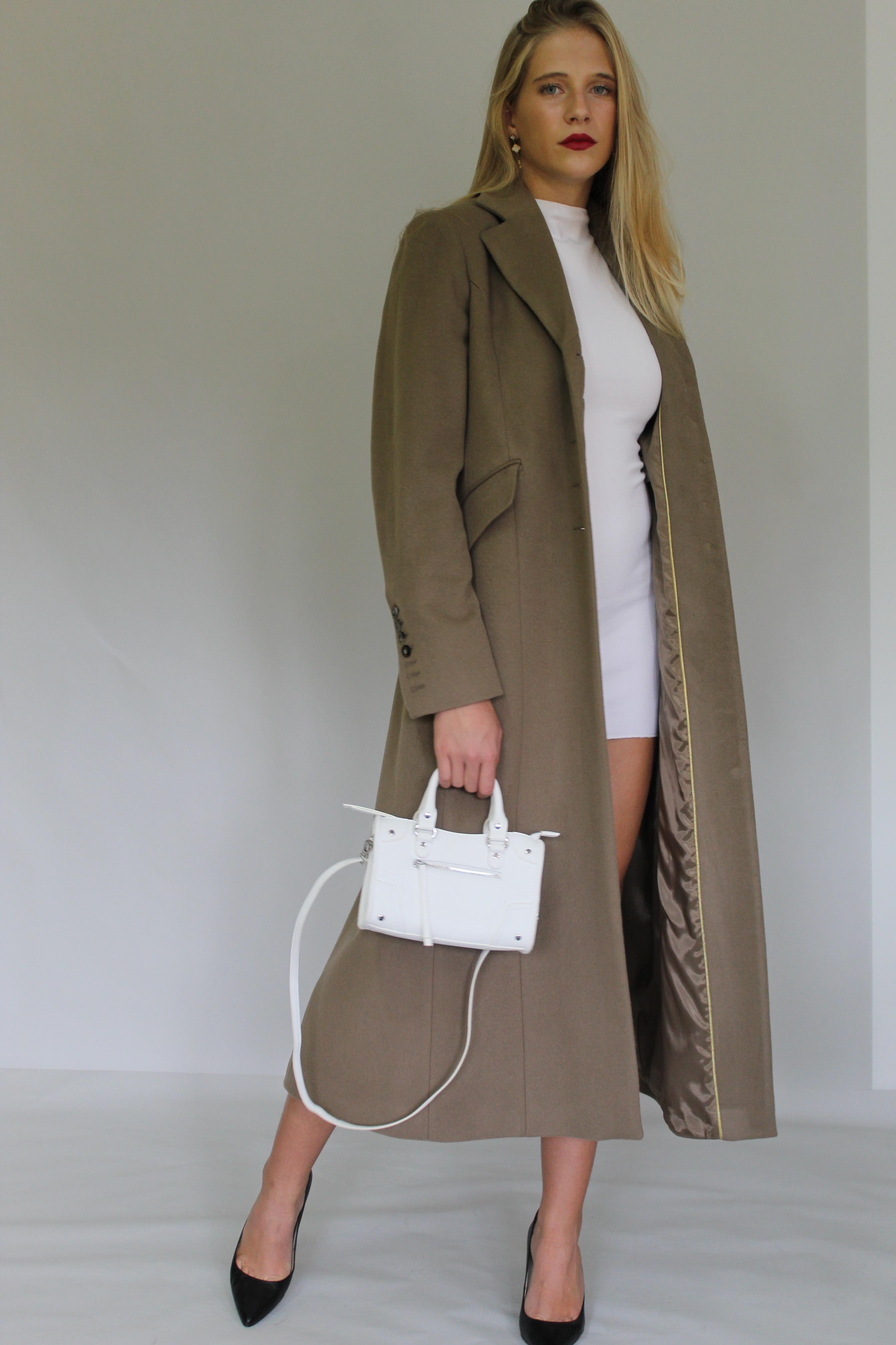 Long Row Buttoning Coat With Sleeve Detail